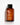 Eine braune Flasche Farm Loves Face Veganes Kollagen + Bio-Hafer Barriere & Hydro Toner mit schwarzem Deckel steht auf einer weißen Fläche und wirft einen linken Schatten. Sein minimalistisches Design hebt den feuchtigkeitsspendenden Gesichtstoner hervor.