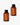 Vor einem schlichten weißen Hintergrund sind zwei bernsteinfarbene Flaschen mit schwarzen Verschlüssen und der Aufschrift „Veganes Kollagen + Bio-Hafer Barriere & Hydro Toner“ von Farm Loves Face zu sehen.