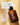 Eine braune Flasche Farm Loves Face All of Farm Loves Face Sparset ruht auf einem Wirbel aus weißer Creme auf Beige. Der Text hebt Bio-Zichorie, Inulin und dreifaches Ceramid zur Unterstützung der Hautbarriere und Ihrer täglichen Hautpflegeroutine hervor.